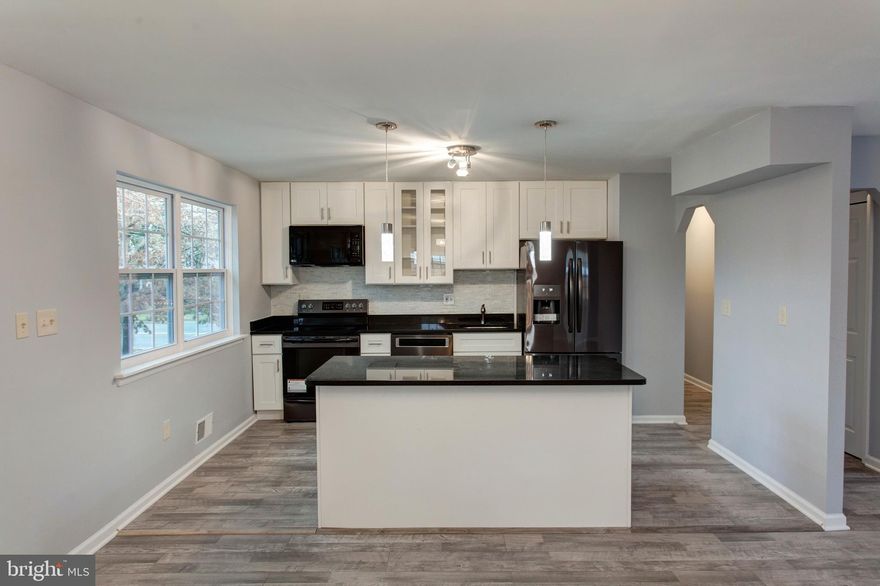 DON'T MISS THIS ONE! BACK ON THE MARKET WITH MORE UPDATES INCLUDING THE NEW ROOF AND NEW ALL WINDOWS. Move-in Ready! Total renovation just completed, Spacious flat corner lot, Shows like a model home, New Roof, Windows, doors,...Open floor plan, New kitchen with granite countertops/ SS appliances, New baths, plumbing, Water Heater/AC, Laminate wood floor in living/dining and entire LL, Fully Finished basement with large rooms and full bath with slider door open to huge flat rear yard, Great location, close to National Harbor,MGM,Resturant/Shops