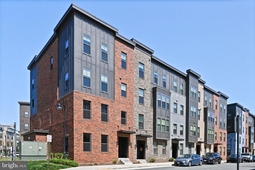 Welcome to the highly sought after One Loudoun Community, where this stunning contemporary and inviting 2,372SF townhouse offers everything you need to make it the ideal home! Upon entry, you will be amazed by the bright, modern open concept design that provides an elegant and relaxing space. The chef’s kitchen is sure to impress with stunning white quartz and glistening stainless steel appliances. This home is ideal for entertaining friends and family with a generously sized balcony off the living area; equipped with an upgraded fireplace and conveying mounted television! Upstairs you'll find perfectly sized bedrooms with large walk-in closets, ideal for guests, or set it up as an office for your dream work from home setup. A second floor washer/dryer room makes laundry day a breeze. All bathrooms have granite countertops and premium fixtures. The luxurious primary en-suite comes with his and her sinks and showerheads. Whole home Nest thermostat conveys and ring system doorbell. Enjoy a finished private garage with driveway accessible from the backside of the unit with plenty of street visitor parking available! This beautiful home is just around the corner from One Loudoun's restaurants and retail shopping. Fantastic location just minutes away from Dulles airport and Routes 7 and 28. The community offers plenty of amenities: rec center with a full sized basketball court, Olympic sized swimming pool, dog park, tennis and pickleball courts, walking trails, and more! The neighborhood is very well-maintained and HOA/Condo dues include water, sewer, trash, snow removal, and landscaping. This one won’t last! Schedule your showing today!