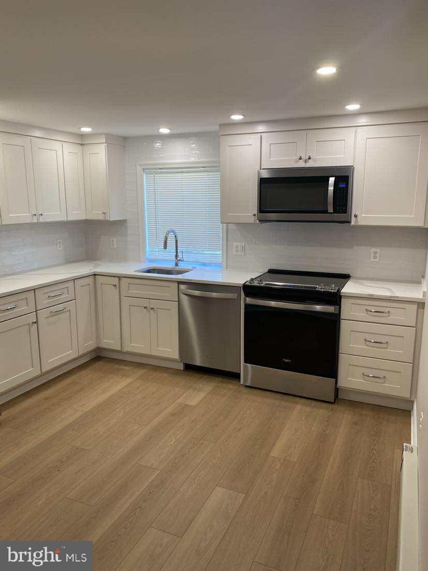 This completely renovated, ground-level efficiency apartment has just been fully remodeled (summer 2025) and is ready for you to call home. Every detail has been carefully considered, from the brand-new appliances (including a dishwasher, stacked washer/dryer, refrigerator with icemaker, and electric stove) and enough room to have a meal at your kitchen table. You'll love the efficient mini splits, ample cabinets and the beautifully designed bathroom that adds a touch of luxury to your daily routine. This apartment is designed for ease of living, requiring minimal upkeep, so you can focus on enjoying your space. Located close to downtown Charles Town and a quick run to the Martins. Credit check required, three times the monthly rent in income, and no evictions. Please note: Absolutely no pets! Please submit applications on Zillow**