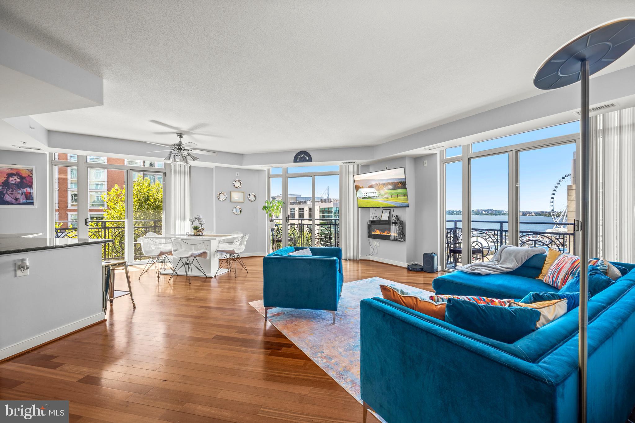 Welcome to a rare find in this waterfront condo building—Unit 319, a third-floor, 2-bedroom, 2-bath, PLUS Den/Office residence that is one of the only five units that offer a full water view. Light floods in through the ceiling-to-floor windows, highlighting the thoughtful layout and serene vistas of the Potomac.
Step inside to enjoy:
-Two spacious bedrooms, each offering closet space and privacy
-Two full bathrooms, including a primary suite where you can unwind after a long day
-Open living/dining areas designed to take full advantage of the water view—ideal for entertaining or relaxing
-Modern finishes and in-unit amenities (washer/dryer, upgraded kitchen/appliances, etc.)
Beyond your doorstep, the lifestyle here rivals many vacation get-aways. Residents at 155 Potomac Passage enjoy resort-style amenities including:
-Rooftop pool & terrace with stunning panoramic water views
-A fully-equipped fitness center
-Elegant social lounge/party/meeting room for hosting guests or community events
-Outdoor grills & seating areas for enjoying alfresco evenings with that water breeze
The location is truly unbeatable. Located directly on the National Harbor, you’ll find waterfront dining, shopping, entertainment, and the iconic Capital Wheel as soon as you step outside. The MGM National Harbor resort & casino is nearby for nights out. Commuting is easy, with access to major roadways and public transit into the DC metro area.
This is more than a condo—it’s a full lifestyle opportunity. If you’re looking for a peaceful retreat that still puts you right where the action is, this is the one!
*** Schedule a showing on Tuesdays or Saturdays between 12-3pm only***
