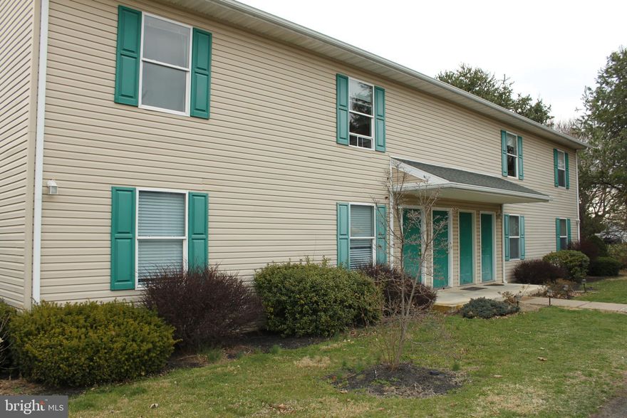 Cozy 2 bedroom, 1.5  bath first floor apartment offers equipped kitchen, family room, walk-in closet and deck off of family room. Convenient parking area in front of building. Trash is included in the rent. Tenant responsible for water and sewer and electric.  Apartment also offers central air conditioning