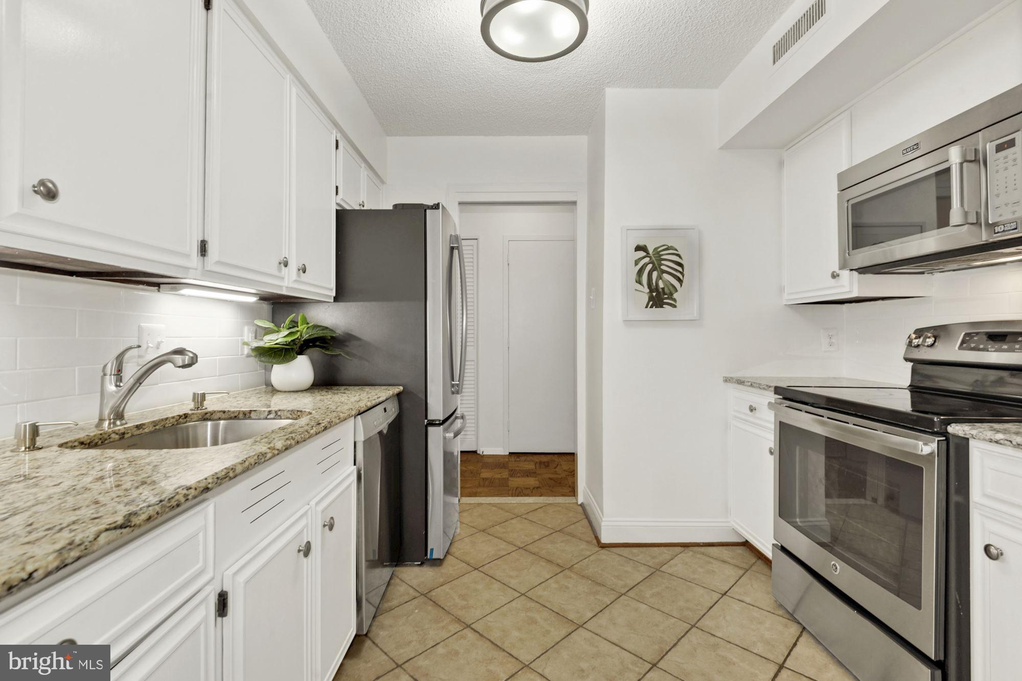 TOWER VILLAS - Residential Lease