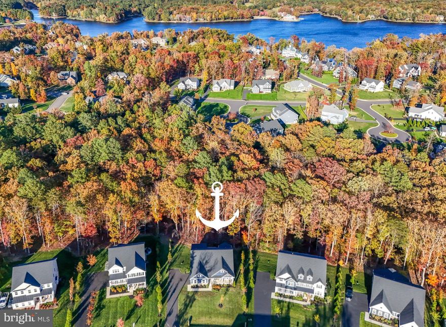 Anchored in the ​luxurious gated lake and golf community of Fawn Lake​ in Fredericksburg, Virginia, this Gorgeous nearly new Dream Home offers ​a modern​, warm and inviting atmosphere ​throughout. 
Motivated Seller is relocating and has found their new home of choice!
​
Here's an incredible opportunity to make this beautifully designed,  ​Modern Rancher built in only 2022, yours! 
Boasting ​main level living on a​ flowing open floor plan ideal for​ casual, everyday living​, and entertaining​. 
​At the center of the home is a spacious ​Family ​Room ​that flows seamlessly to an impressive ​Gourmet ​Kitchen featuring a massive island, quartz countertops, double ovens, ​tile backsplash, and a large pantry, perfectly suited for both everyday living and entertaining. The ​adjoining Sunroom flooded with brilliant sunlight, serves as an ideal Dining​ Room. Sliding doors provide easy access to a​n inviting covered porch, perfect for indoor-outdoor gatherings. 
​A quiet retreat, the main level Owner’s Suite with ​private access ​outdoors to the serene covered ​porch, features a beautiful light-filled Spa Bath with dual vanities and tile shower.​ ​Double walk-in closets​ offer plenty of wardrobe ​storage. 

Two additional gracious Bedrooms with walk-in closets share a beautiful Full Bath.
The convenient main-level Laundry Room provides everyday ease.

​Expanding the living space, the amazing walk-out lower level features a massive Recreation Room, which provides unlimited entertainment possibilities. A huge Bedroom with an adjoining Full Bath ​offers comfortable ​extended living for Guests. ​ Glass sliding doors provide direct access to an inviting ​Flagstone patio overlooking the private backyard abutting to a wooded conservation area​.
​ 
​The serene natural backdrop makes outdoor living​ just as special​. Exceptional privacy, peaceful moments and effortless entertaining on the covered rear porch ​can be enjoyed year-round. 
​This turn-key Home is nestled on .40 acres at the end of a quiet​ cul-de-sac, ​near the Fawn Lake Marina​! Take daily strolls or bike rides along the nearby trails ​to​ savor the beautiful sights and sounds of nature​, or meet friends​ at the marina. Imagine​ kayaking, ​paddleboarding, fishing, swimming and breathtaking sunsets​ only steps from your front door! 

Enjoy the exceptional ​Fawn Lake lifestyle and live with ease in this nearly new turn-key home, expertly crafted with energy efficient materials such as a high efficiency HVAC, low maintenance ​Hardi-Plank siding and stone exterior finishes.​  Here you can downsize your home, while elevating your lifestyle!​ Come experience the Fawn Lake Lifestyle and start enjoying our unique way of life!
​
The beautiful luxury and vibrant Fawn Lake Community offers amazing amenities such as a boating recreational lake, sandy beach, an Arnold Palmer designed Golf Course, tennis courts, baseball and soccer fields, dog park, volleyball courts, walking trails, Community ClubHouse, marina, fitness center, restaurants, Country Club, playgrounds, and so much more! Plus with an array of clubs, groups and daily activities, you will have plenty of opportunities to join the social scene, make new friends and remain active all year-round!
Located in the countryside near the town of Fredericksburg, surrounded by park lands and only a few miles to the farm market, wineries, and award winning breweries! Conveniently located to shopping, restaurants, top-rated Riverbend District schools and I-95!​  
Discover refined living in the prestigious lake and golf community of Fawn Lake.