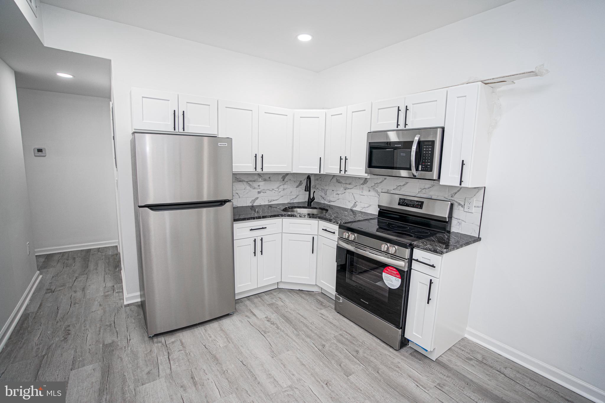 Welcome to this newly renovated 4 unit home on a tree lined street in the Walnut Hill neighborhood. An opportunity like this doesn't come around often. Each unit is 2bd/1ba with all new flooring, lighting, bathrooms, kitchens and ample closet space. This property also features brand new, electric, plumbing and HVAC throughout. The possibilities are endless with this property- you can live in one unit and rent the other three units out providing immediate cashflow. This home is also close to major universities, shopping, public transportation and highways convenient to get anywhere in the city. This is an opportunity you don't want to miss out on. Schedule your showing today!