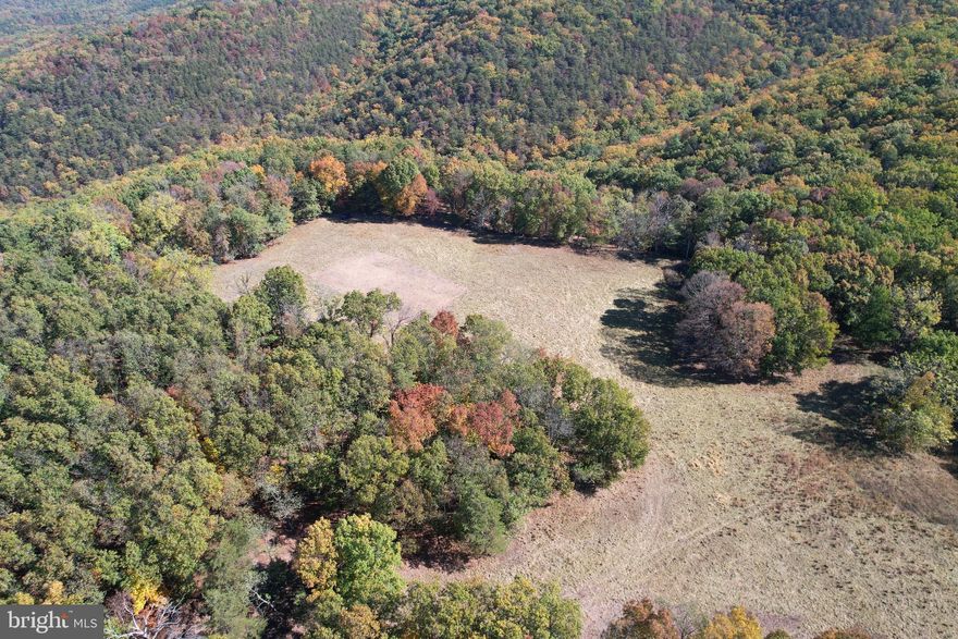 🏡 Rare Opportunity: 131.75 Acres with Home & Scenic Mountain Views – Petersburg, WV
Two beautiful parcels totaling 131.75 acres are being sold together just off South Mill Creek Road in Petersburg, West Virginia. This unique property offers endless potential for farming, hunting, recreation, or development.

Parcel 1 – 51.5 Acres (Tax ID: 03 508001200000000)
This parcel includes an older 2-bedroom, 1-bathroom home that has been vacant for several years. The structure is being sold as-is and would likely be best suited for removal or complete renovation. The land itself features a mix of open space and woods, making it a prime location for a new homesite, weekend getaway, or investment build.

Parcel 2 – 80.25 Acres (Tax ID: 03 508002500000000)
Mostly wooded with a beautiful fenced-in field at the top—perfect for livestock, agriculture, or food plots. The properties also includes:

A wet weather spring

A natural mineral lick—great for wildlife

A spring box/holding tank approximately 60 feet deep and 2x2 feet in size

Both parcels offer a secluded, peaceful setting with panoramic views, natural features, and abundant wildlife—ideal for hunters, homesteaders, or outdoor enthusiasts.

Whether you're looking to build, invest, or escape to your own piece of Almost Heaven, this property offers the space, privacy, and potential to bring your vision to life.

📍 Just minutes from downtown Petersburg and convenient to local amenities, hiking trails, and fishing spots.
