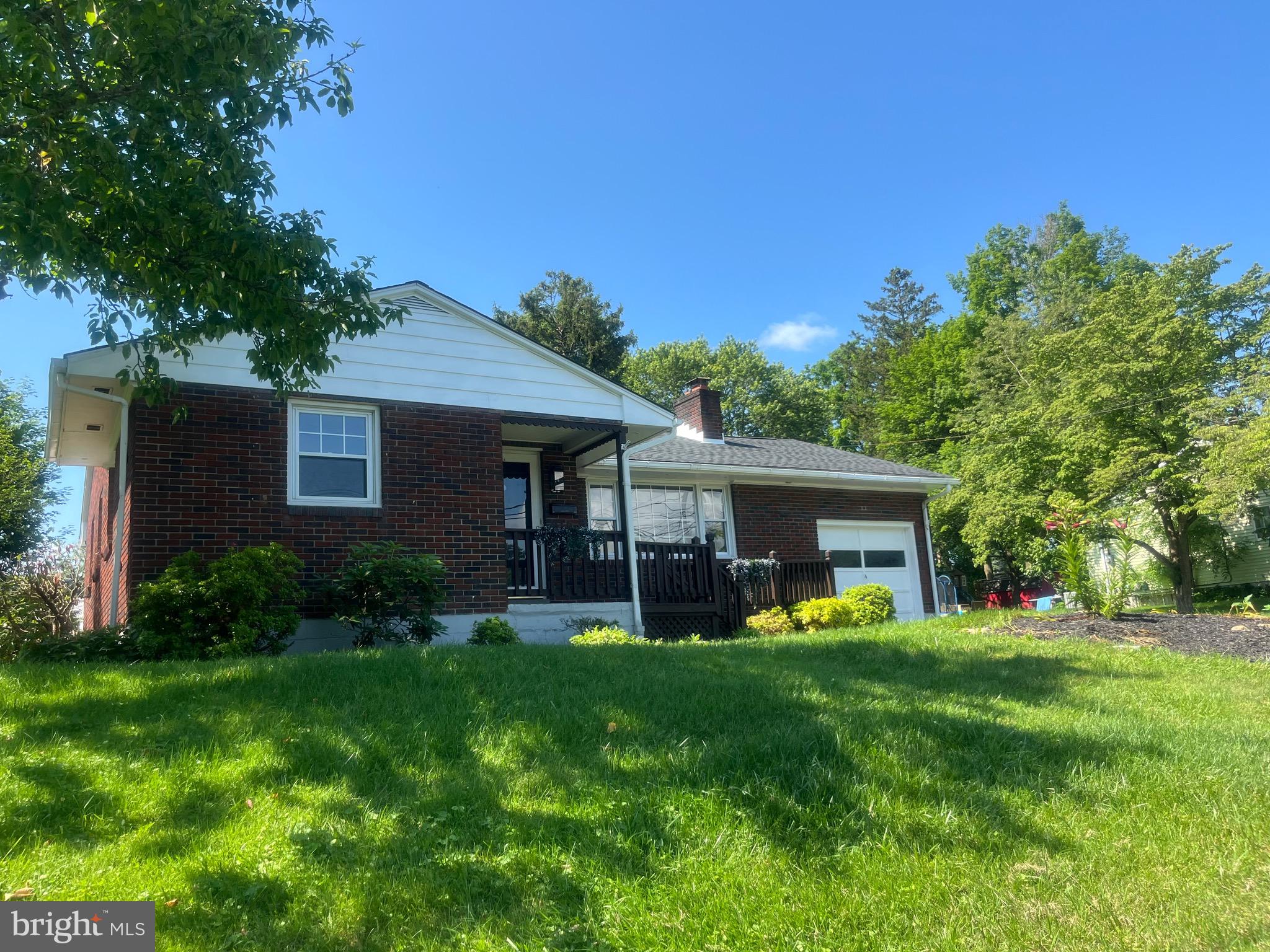 Welcome home to this beautifully maintained brick ranch offering 3 spacious bedrooms and 2 full bathrooms. Enjoy cozy evenings by the brick fireplace in the inviting living room or relax year-round in the screened-in sunroom. The home features a full, partially finished basement—perfect for a rec room, home gym, or extra storage. An attached garage provides added convenience. Step outside to your own private oasis: a large fenced yard, complete with a gazebo, utility shed, and an above-ground pool—ideal for summer fun and entertaining! Don’t miss this one-of-a-kind property that combines comfort, privacy, and outdoor living. Schedule your showing today!