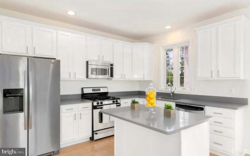 This beautifully furnished 3-story brick end-unit townhome in downtown Wheaton offers a perfect blend of comfort and convenience. With 3 spacious bedrooms, 2 full bathrooms, and 2 half-bathrooms, the home provides ample living space across its well-designed layout. The main level boasts hardwood floors throughout, an expansive kitchen with sleek stainless steel appliances, quartz countertops, and a large island perfect for entertaining. The upper level is carpeted for added warmth, while the lower level features durable ceramic tile floors.
Additional highlights include a cozy fireplace, a dedicated office space, and modern amenities such as Ring security cameras and a Nest thermostat for enhanced comfort and peace of mind. Enjoy the convenience of a 1-car garage and the prime location—just steps from the Metro Red Line, trendy shops, restaurants, and easy access to I-495.
A 2-year lease is preferred. The unit is offered fully furnished, though it can also be rented unfurnished for less per month. This is an exceptional opportunity to enjoy a turn-key home in one of Wheaton's most sought-after areas.