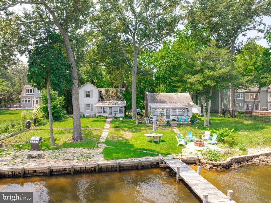 Unique Waterfront Opportunity on the Magothy River. This rare estate sale offers two summer cottages—positioned on a combined 148 feet of pristine water frontage along the Magothy River. Situated on three separate lots sold together as one transaction, this property features scenic views,  a private dock, and endless potential. Both cottages are in significant need of renovation, making this an ideal project for investors, builders, or visionaries looking to create their dream waterfront retreat. Properties are being sold strictly as-is. Don’t miss this chance to own a piece of private waterfront with exceptional value and possibilities.