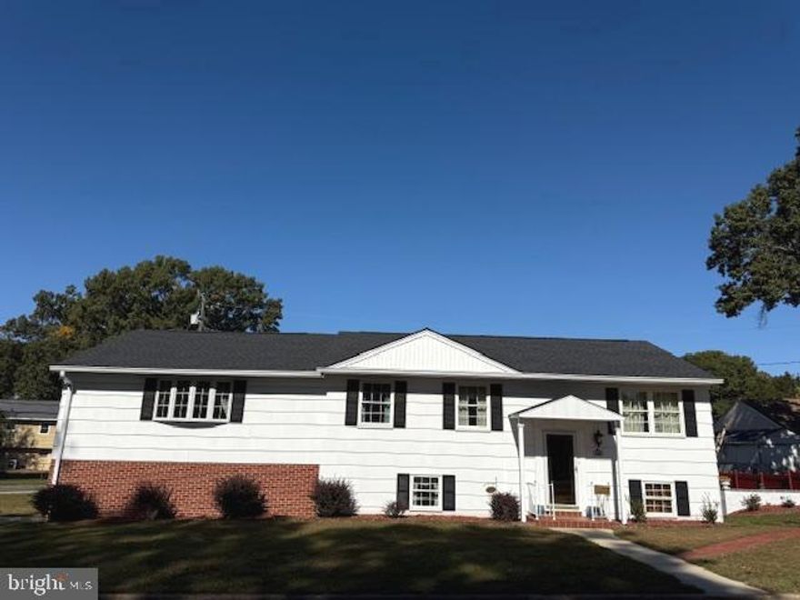 Welcome Home!  If it is size you are looking for or the potential of an in law suite you have found the home you are looking for.  This true 5 bedroom  2 bath home is situated on a large corner lot on one of the nicest streets in Green Haven.  Pasadena with pubic water and sewer!   There is water access.  It is walking distance to the Green Haven Wharf that offers 100' pier to relax and enjoy the beauty of Stoney Creek.  There is a kayak ramp, you can swim or just take in the beauty of the coastal scenic view.  On a summers day you only need to walk out your back door to your own private oasis.  The privacy fence, level yard with plenty of room for gaming, multiple patios, and of course an in ground pool with diving board and lounging areas is truly the perfect place to entertain your family and friends.  This property offers a 2 car attached garage and oversized concrete driveway.  Perfect for the car enthusiast and plenty of area for your  RV , boat or collectable cars.  No HOA or Front Foot.  Upon entering you are greeted by an elegant chandelier.  The main level offers Living room and dining rooms that are carpeted but there is hardwood underneath if that is your preference.   There is a full kitchen with area for a table and egress to your rear yard and an awesome large deck for your morning coffee.  There are 5 bedrooms on this main level.  The Primary Bedroom is HUGE and has a private bathroom.  There is lots of natural light up and down as the basement is built above grade with windows in every room.  The basement has a full size bar and the stools convey.  A family room and a kitchen that is sure to please the chef.  There is a pantry and a spacious dining area.  The washer and dryer are on this level as well.  There is a door to the back patio if you are more the shade dweller.  This basement can easily be a full and private in-law suite with the addition of a bathroom!   The options for this well cared for and loved home are endless   Some details:  Pool liner new May 2025, New architectural roof May 2025, New Front door Canopy April 2025, New Furnace June 2025, New AC 454 System June 2025, New  Gas How Water Heater June 2025, New Washing Machine May 2025, Pool Patio June 2025.  Walk to schools, shopping, restaurants, parks etc. Jump on the free county bus and yes this property is super commuter friendly with convenient access to Baltimore, Annapolis and D.C.  making it the perfect combination of peaceful suburban living and modern convenience.  Stop by today and Stay for a Lifetime!