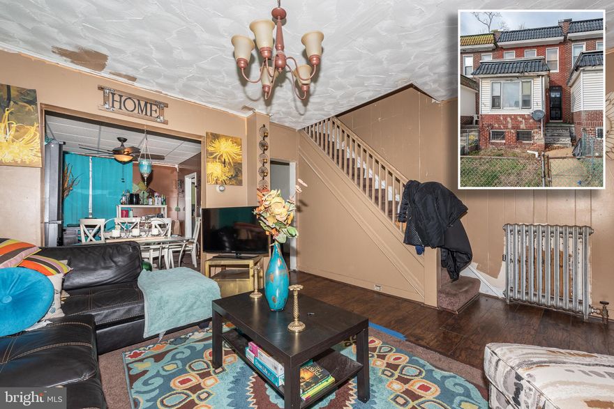 EXCELLENT VALUE FOR THIS TURN KEY ROWHOME WITH LARGE ROOM SIZES! Traditional Floor Plan featuring a combination of hardwood floors, ceramic tile & carpet throughout the main level, spacious living room with a finished enclosed front porch attached, separate dining room, long kitchen with an additional dining area, 3 upper level bedrooms with a full hall bath featuring ceramic tile, a mostly finished basement with a washer and dryer, and a large backyard. Get the most space & great value in this city rowhome!  Sold As-Is!