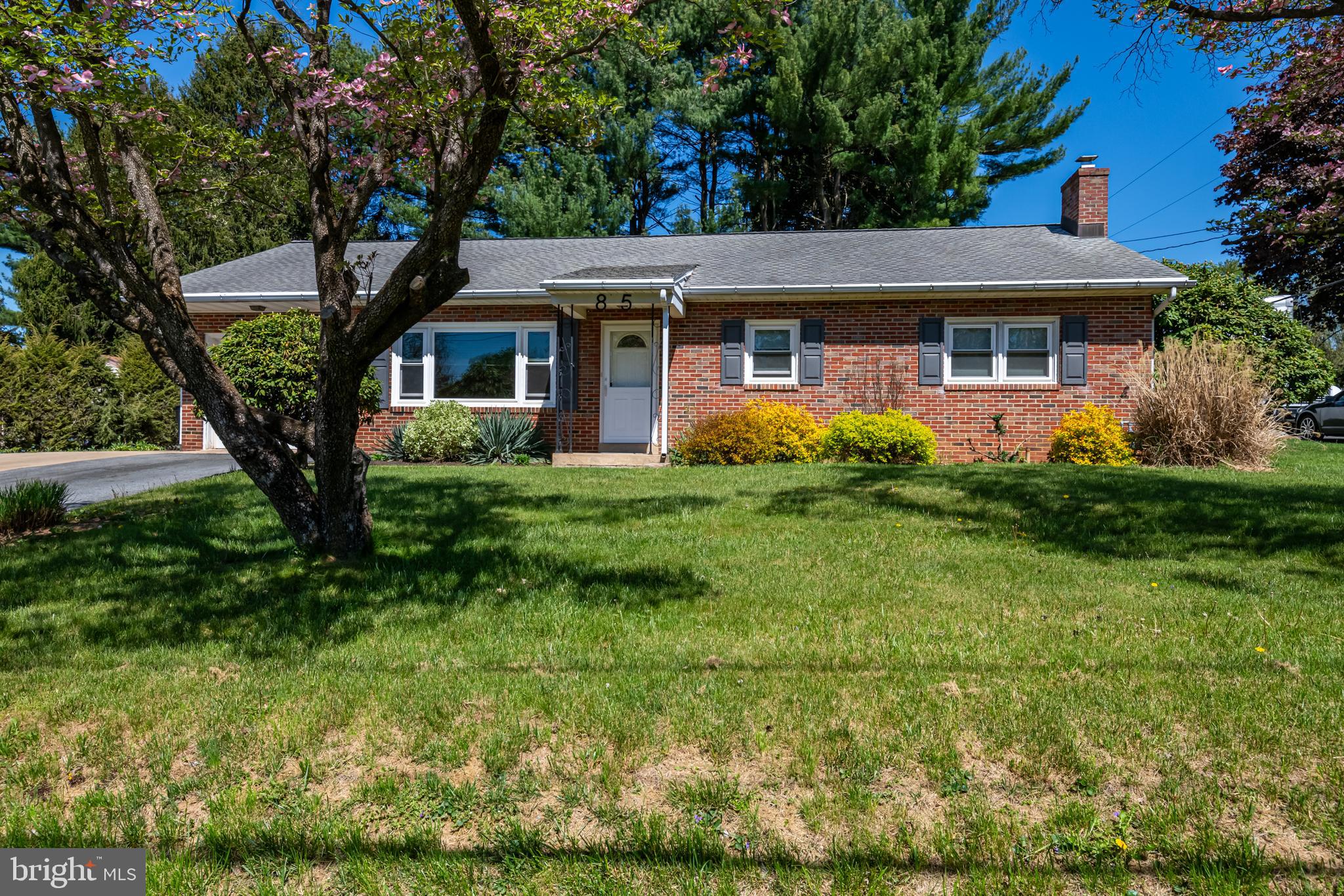 Opportunity knocks for this updated red brick rancher in a quiet neighborhood ready and waiting for you! Step inside and enjoy luxury vinyl plank flooring throughout the entire main level making clean up a breeze and reduce your allergy flare ups. Living room is accented by picture windows and electric fireplace to take the chill out of any evening. Updated kitchen has a huge island, which is the perfect gathering place. Plenty of cabinets are covered by granite counters with tiled backsplash. Kitchen and dining area overlook the fenced in backyard so its easy to keep an eye on loved ones. Updated bathroom features tiled walls and floors with walk-in shower, two closets, and blue tooth speaker to listen to your favorite show or music. Spacious bedrooms have lots of closet space with motion lights and ceiling fans. Central air keeps you cool on those extra warm days. The hallway closet has hookup for washer and dryer if you don’t want to head to the basement. Walk up attic gives you extra storage. Lower level full bathroom currently only has a toilet but ready and waiting for your personal finishes. Newer gas heat and hot water help keep your monthly budget in line. Attached one car garage is deep enough for extra storage. Additional off-street parking pad too. Awesome Muhlenberg location is close to Jim Dietrich and Laurelain Parks, along with 5th Street Highway shopping and Route 12. Don’t miss out on this great place you will be proud to call home!
