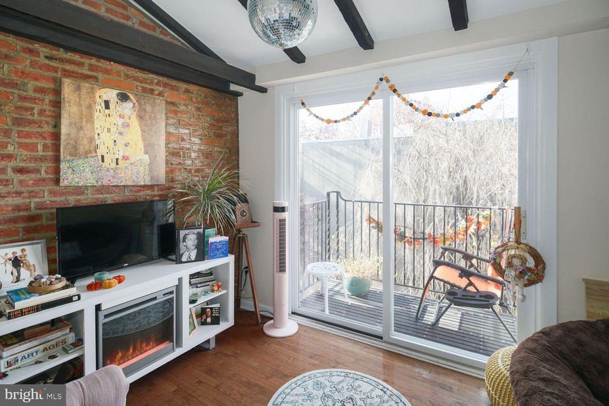 Welcome to this enchanting trinity-style home nestled in the heart of Queen Village! Enter through a gate to a spacious and serene courtyard to your door. The first floor has an updated kitchen with granite countertops, wooden cabinetry, updated appliances, and a generously sized pantry closet. On the second floor, you'll find a versatile space that can be used as a bright den, home office, or second bedroom. The third floor boasts a bright, airy bedroom with an ensuite bathroom, exposed brick wall, and vaulted wood beams exuding warmth and character. Step out onto the terrace and enjoy a serene view of the courtyard - a perfect retreat for relaxation. An unfinished basement houses the washer and dryer and provides ample storage space. With its classic layout and modern updates, this home effortlessly blends historic charm with contemporary comfort. This home can come partially furnished, ready for you to move in and make it your own! Conveniently located to 95, 676, parks, coffee shops, and more!