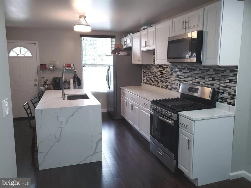 Discover Charming Baltimore Living in the Franklintown/Mosher Neighborhood! This 3-bed, 1.5-bath home welcomes you with a versatile center room with skylight which can be used as a sleeping room, walk-in closet or office. The kitchen features a dishwasher, gas stove, and island. Washer/dryer included (pictures are from previous listing). Plenty of basement storage and on-street parking. Property is currently tenant occupied ***DON'T MISS OUT | Minimum Credit Score 600 | APPLY ONLINE | SECURITY DEPOSIT based on credit rating (1-2 Month's Rent) | Vouchers are Welcomed