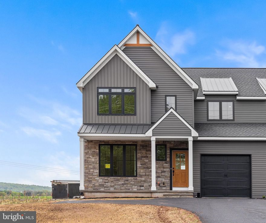 Not every new construction home feels like this.

Set against open, peaceful pastures in Denver, PA, this brand-new twin gives you that rare balance, modern, elevated design with a setting that actually lets you breathe.

From the moment you walk into the two-story foyer, the space opens up in a way that just feels right. The main level flows effortlessly from the family room into the kitchen and dining area, creating a layout that works just as well for everyday life as it does when people are over. Wide-plank flooring runs throughout, paired with 8-foot ceilings that keep everything feeling light, open, and easy.

There’s also a full bath and a flexible front room on this level. Perfect as a true home office, guest space, or even a fourth bedroom if you need it. Off the back, a patio overlooks the surrounding greenery, while the front porch gives you another quiet spot to start or end your day.

Upstairs is where it really settles in. The primary suite is designed to feel like a reset, tray ceilings, two walk-in closets (yes, two), and a clean, spa-style bath with a large tiled shower. The additional bedrooms aren’t an afterthought either, with vaulted ceilings that add character, and a second-floor laundry that just makes life easier.
You’re getting 3 bedrooms, 3 full baths, a one-car garage, and a layout that actually adapts to how people live now.
And location-wise... it’s one of those spots that quietly checks every box. Close to the PA Turnpike for commuting, and just about a 30-minute drive to King of Prussia Mall, so you’re never far from everything you need… or want.
It’s not just a new home, it’s a different pace, without giving anything up.