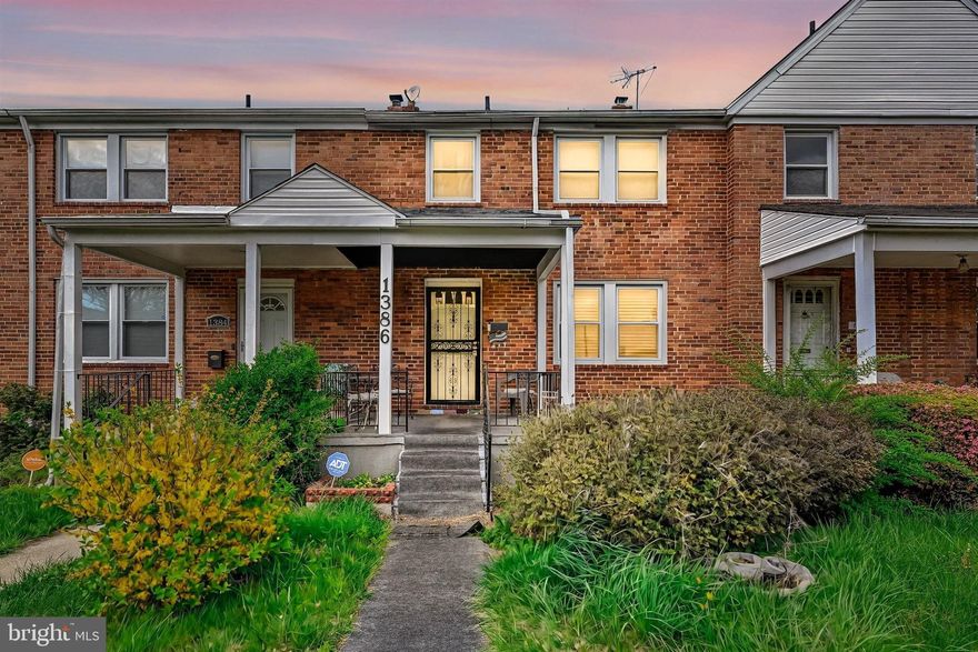 Welcome to 1386 Pentwood Road — a classic brick townhome in Baltimore’s Northwood community, just around the corner from Morgan State University. This well-kept home offers three finished levels with a flexible layout that includes 3 bedrooms, 1.5 bathrooms, and a finished attic space ideal for a home office or guest room.

The main level features hardwood floors and a traditional floor plan with a spacious living room, formal dining area, and an updated kitchen with granite counters, gas cooking, and stainless steel appliances. Upstairs you’ll find three bedrooms and a full bathroom with updated tile and natural light. The finished basement adds a second living area, half bath, laundry, and walkout rear access.

Out back, enjoy a private fenced yard with a brick patio and a rear parking pad — a rare bonus in the city. Major systems including the roof, HVAC, and hot water heater have been updated in recent years. Conveniently located near commuter routes, shopping, Lake Montebello, and public transit.

This one checks the boxes — space, condition, and location — all at a solid value. Come take a look.