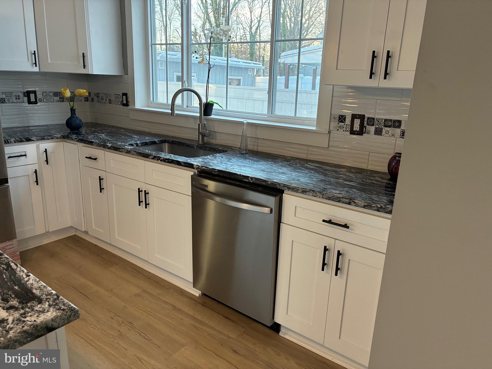 80 E 3RD STREET