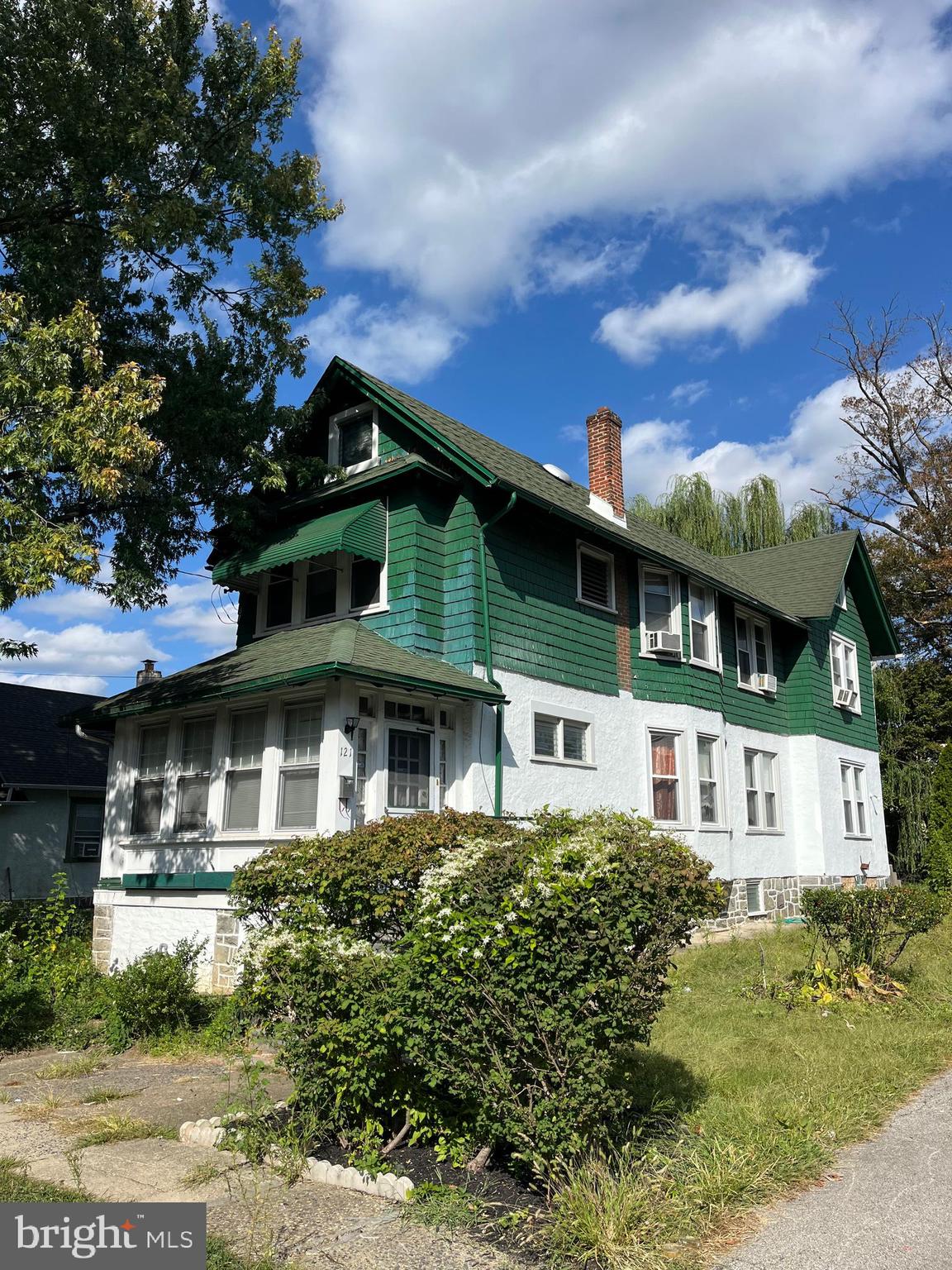 This spacious 4-bedroom, 1.5-bath home offers plenty of room to grow and personalize, nestled on a large, level lot in a desirable neighborhood. With a two-car detached garage and a sun-filled enclosed porch, this property is ready to become your dream home with a little TLC.