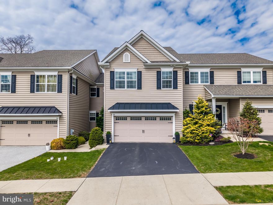 Welcome to 32 New Village Greene Dr, a beautiful townhome in the Village Greene community! Located in picturesque Honey Brook, the 3 Bedroom, 2.5 Bath home is just what you’ve been looking for! This home features gorgeous hardwood flooring, lots of natural lighting and an open concept floorplan. The main level has a spacious Dining Room and Living Room with gas fireplace, and a walk out to the deck, and Kitchen. The Kitchen offers granite countertops, beautiful cabinetry with crown molding, and stainless-steel appliances to include a gas range. There is a large center island with double sink and additional storage! Walk out your back door to entertain guests on a spacious deck overlooking a gorgeous setting and the walking trail.   A convenient half bath finishes out the first floor.  You’ll find the Laundry Room upstairs, located conveniently near the bedrooms—no more hauling bulky laundry baskets up and down stairs! The Primary Bedroom features vaulted ceilings, a large walk in closet and private bathroom en suite with double vanity,  large stall shower and oversized soaking tub. Two good sized secondary bedrooms share a full hallway bath with shower/tub. Finished basement makes a great rec room, office or flex space and ready to accommodate your family’s growing needs, and there is a 2-car attached garage,  plus parking for 2 cars in driveway! Village Greene community has walking trails, a play park, and open common areas! Great Location—convenient to Route 322, 82, and 30. Call now to schedule your private showing!