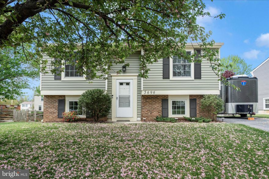 Updated split foyer in Farmbrook! Major mechanical and structural updates include: professional hardscape and landscaping (2025), full house insulation wrap, replacement vinyl siding and gutters/downspouts (2023), on demand hot water heater (2023), electric panel (2023), fully remodeled kitchen (2023), deck (2022), storage shed (2022), HVAC, Roof and Windows. Main level primary bedroom with ensuite luxury bath and walk-in closet. Primary bath includes walk-in shower and jetted soaking tub. Lower level includes 3 additional bedrooms, full bathroom, laundry and utility room. Covered walk-out from lower level to  yard.