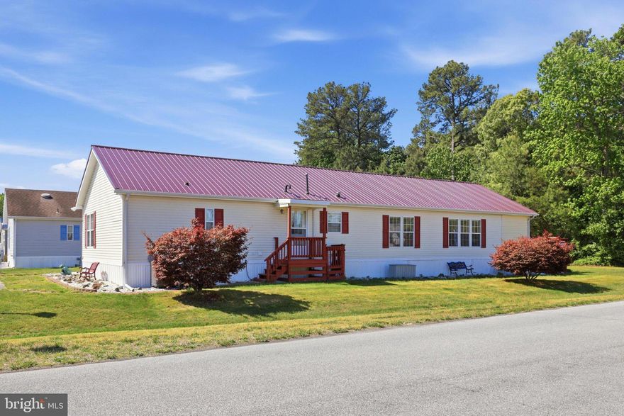Welcome home to this beautifully maintained, move-in ready property located on a desirable corner lot in the Village of Cool Branch! Offering over 2,100 square feet of living space, this home stands out from many of the newer homes in the community with its spacious layout, multiple living areas, and oversized rooms throughout. Featuring 3 bedrooms and 2 full bathrooms, the thoughtfully designed floor plan includes a formal living room, cozy den, dining area, sunroom filled with natural light, and a separate laundry room for added convenience.

The expansive primary suite offers a true retreat with a sitting area, walk-in closet, and private ensuite bath complete with a soaking tub and separate shower. Outside, enjoy the benefits of the large corner lot with a paved driveway, shed, covered porch, side deck, and beautiful hardscaping.

If you’ve been searching for a home that offers more space, more functionality, and exceptional condition compared to typical new construction options nearby — this is the one. Community amenities include an in-ground pool, playground, basketball court, and fishing pond.
