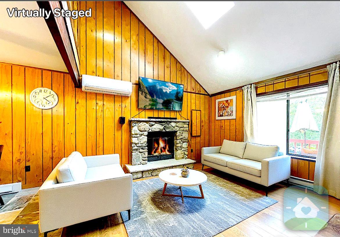 Find your DREAM GETAWAY in the heart of the Pocono Mountains at Big Bass Lake! This BEAUTIFUL 4-bedroom, 2-bath WITHING WALKING DISTANCE TO POOL! This home perfectly combines MODERN convenience with MOUNTAIN CHARM, making it ideal for FAMILY retreats or a smart Airbnb INVESTMENT. Step into an inviting OPEN FLOOR PLAN, perfect for relaxing or hosting guests. The living area features a cozy WOOD-BURNING stone FIREPLACE, perfect for chilly nights. The UPGRADED kitchen boasts STAINLESS STEEL appliances, GRANITE countertops, and plenty of prep space for your favorite meals. A gas-powered HOUSE GENERATOR adds extra security, keeping you prepared for any situation.
With most furnishings included, all you need to do is pack your bags and enjoy this Pocono retreat. The home also offers a spacious HEATED GREAT ROOM, measuring 33'x21', with a large dining area, bar, and comfy living space—a hub for gatherings. Two well-designed BATHROOMS add convenience for everyone. Step out onto the FRONT DECK to sip your morning coffee and take in the natural surroundings.
Big Bass Lake offers year-round amenities, including INDOOR and OUTDOOR POOLS, TENNIS COURTS, and a SNACK BAR CLUBHOUSE. Outdoor lovers will enjoy TWO pristine LAKES with SANDY BEACHES, perfect for SWIMMING, FISHING, and KAYAKING. The community amenities and location make this home a great option for SHORT-TERM RENTALS, giving you the chance to offset costs while enjoying your MOUNTAIN ESCAPE!
Whether you're seeking a personal retreat, a year-round home, or a SMART INVESTMENT, this Big Bass Lake property offers endless opportunities. Pack your bags and start making unforgettable memories in the Poconos!
