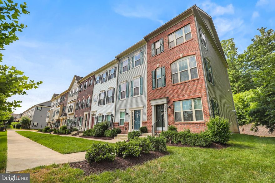 Welcome Home! Luxury end unit , 4 level townhome with over 2,000 sq ft, HW floors, main level bedroom and bathroom, a total of 4.5 baths in fact! Huge Primary bedroom w/en suite, masterful craftsmanship, and every modern convenience was considered when building this  top tier townhouse including location! Right outside of the Quantico base, the commute to work has never been easier! Every detail was considered to achieve unparalleled quality from the trex deck and crown moulding throughout to the beautiful hardwood flooring on the entire main living room/dining room level, not to mention the additional bump out of cabinets added to the dry bar area in the kitchen. Open concept living at it's finest with over 2, 000 sq feet of end unit luxury living! Built in blue tooth surround sound in living room, huge primary bedroom with his/her closets.  4th level loft area  includes full bathroom w/dual vanities and can serve either as a 4th bedroom or spacious and bright office space- so many options!  Attached 1 car garage with 1 car driveway, and an abundance of visitor parking just outside this end of row, end unit town home!  Spectacular private deck off the kitchen outlooking the tree line is perfect for entertaining guests or having a quiet evening in with a spectacular sunset. Gorgeous community pool & tot lot just around the corner from your front door! 2 mins from Quantico Marine base, easy access to VRE and commuter lots. This home defines "location, location, location!!" You have arrived! Worth the wait- Welcome home!!  (***Deadline to submit offers= 6  pm SUNDAY 6/27- UPDATED**, pre-inspections welcome).