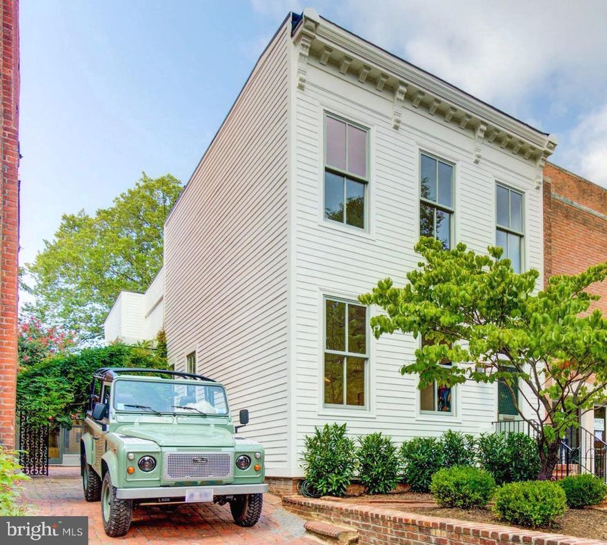 Envision life unfolding on one of the Hill’s most coveted blocks. This stunning 5-bedroom, 3.5-bath home is perfectly appointed for hosting unforgettable parties where guests flow seamlessly from gracious interior rooms to wraparound brick patios. One of only a handful of homes on Capitol Hill with a private driveway, it also includes a carriage house with functionality as a home office, gym or guest suite. Situated on one of Capitol Hill’s most iconic tree-lined streets with strategic proximity to the Capitol Complex, the location keeps you connected to both neighborhood charm and metropolitan energy. This isn’t just a home—it’s your invitation to live where history is made. Your Capitol Hill story begins here.