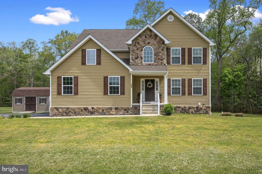 Welcome to this beautifully maintained 4BR/2.5BA home located on a 1/2 acre lot in Hunters Run. This home features over 2,400 square feet of living space with an additional finished basement. Enjoy the spacious open concept eat-in kitchen that overlooks the family room. This bright open concept kitchen includes 42-inch cabinetry, stainless steel appliances, gas range, an island/breakfast bar, and a large pantry (that could be used as a laundry room). Enjoy the large deck perfect for outdoor dining or entertaining overlooking peaceful wooded views with great privacy. Beautiful hardwood flooring welcomes you in the foyer and formal dining room. The second-floor owner's suite has a huge walk-in closet with a full private bath and dual sinks. Three additional well-sized bedrooms with large closets, and a full guest bath.  Additional features include new carpet, and an oversized 2-car garage. The finished basement offers endless possibilities for customization-whether you need more living space, a home gym, or additional storage. Beautiful French doors invite you into a guest room, office or den. This home also includes a water softener. Hunters Run community is located close to Route 13 with quick access to Route 1, Dover Air Force Base, and the Delaware Beaches. Call for your private tour!