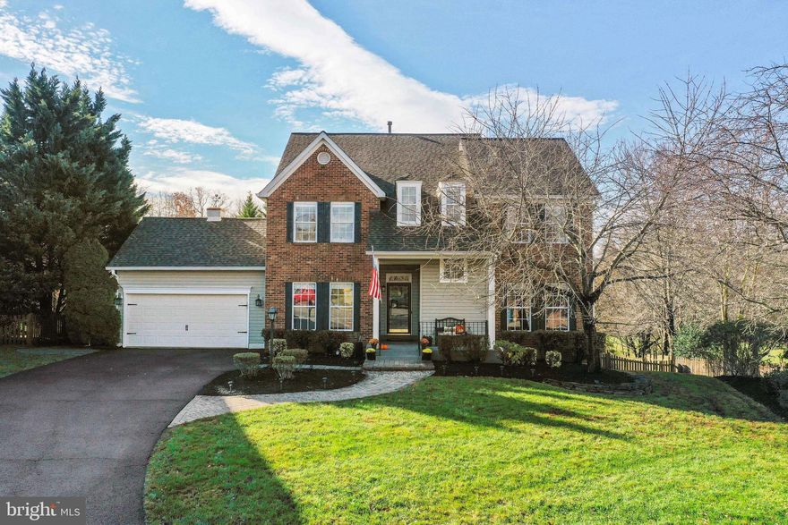 This Gorgeous home sits on a unique private lot backing to protected greenspace in highly sought-after Ashburn Mews! This unique enclave has only 13 homes and backs to parkland. The generous floor plan allows for family gatherings and entertainment spaces. Kitchen with granite countertops, island and lots of space. 5 Bedrooms all on the upper level is great for families. Large primary bedroom with soaring ceilings. Working from home? Plenty of dedicated office space on multi-levels for privacy. Finished lower level is walkout with plenty of space including a full bar, recreation rooms, Theatre Room, workout room and more. Enjoy your back yard which is a private oasis where you can have summer parties on the decks with Pergola and lower patio. Quietly sited on fenced backyard backing to common area & Ashburn Park for added privacy. The street is a cul-de-sac without through traffic. Fabulous 2 Car Garage and a great storage shed with built-ins.  Great Central Ashburn location, and the W&OD trail is 2 blocks. Amenities nearby, and the quick access to the Dulles Greenway and the Silver Line metro.