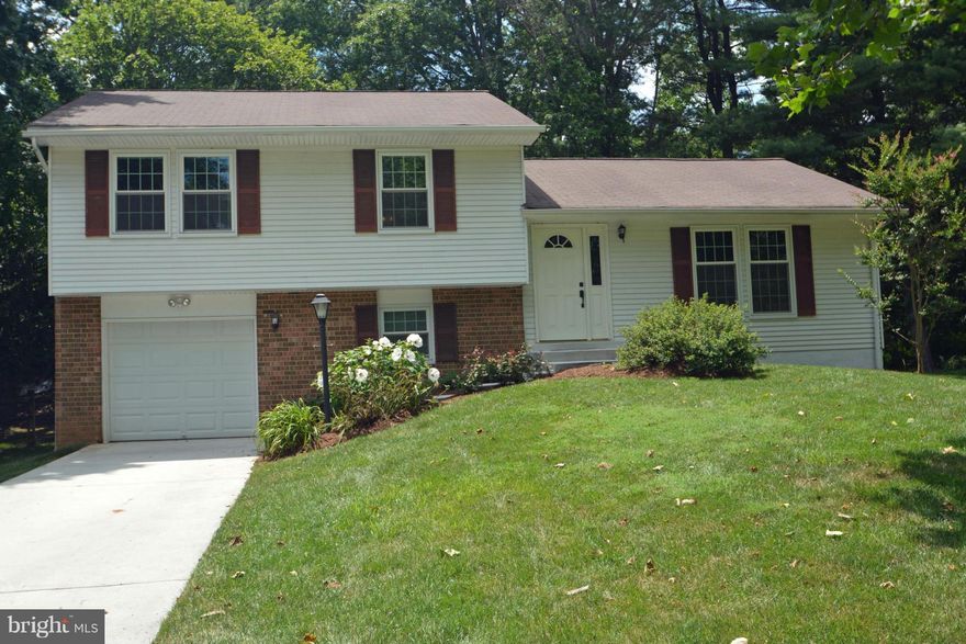 BEAUTIFUL 4 LVL  HOME W BRIGHT OPEN FLR PLAN. METICULOUSLY MAINTAINED &  UPGRADED  : REMODELED KITCHEN W SILESTONE COUNTER TOPS, UPGRADED CABINETS , SS APPLIANCES (NEW STOVE, MICROWAVE DISHWASHER).BRAND NEW BATHS. HRWD FLRS ON MAIN LVL. LL 4th BR OR OFFICE. SLIDING DR FROM FAM RM OPENS TO NICE LVL YARD. LARGE BASEMENT. REPLACED WINDOWS, ROOF, HVAC. WALK TO POOL, WALKING PATHS, SOCCER FIELDS, SHOPS