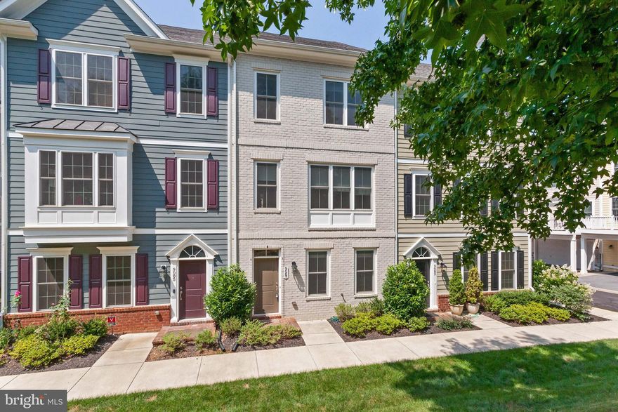 Introducing this Beautiful  Main Street Greenbrier Townhome located in the desirable Worthington Square area of the Villages of Urbana! Just minutes away from plenty of great restaurants, shops, and entertainment to choose from, and walking distance to schools and local library. The first floor entry level features a foyer, a cozy bonus room *great for a den or an office area*, along with a half bathroom. Work your way up to the main level where you will find  a super spacious  kitchen & dining area with an open concept, along with a  family room, and another half bathroom! The main level offers great natural lighting, and gleaming hardwood floors all throughout. This gourmet kitchen features BEAUTIFUL granite counter tops, stainless steel appliances, and an island with a perfect size breakfast bar. Right off of the kitchen you have a spacious & sunny dining area; a perfect place to start your morning with a cup of coffee and soak up the sun! This area brings you right out onto the large upper deck.  On the upper level you'll find the master suite, 2 bedrooms, 1 full bathroom and the laundry area.  The master suite boasts a tray ceiling, a walk in closet, and a stunning master bathroom!  Across the hall you'll find two additional bedrooms that are perfectly sized, along with a full bathroom, and a private  laundry area to complete the top level.  You won't want to miss this!