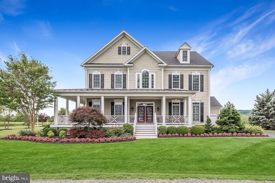 Stunning Leesburg home situated on picturesque 1+ acre lot with resort-level outdoor amenities.  Coming Soon - check out the virtual tour while you wait! Imagine spending this coming summer enjoying the saltwater pool (Gunite pool with Pebble Tec finishes) features waterfall and spa, entertaining around the stone wood burning  fireplace in the cabana, grilling in the outdoor kitchen on the patio, or simply enjoying morning coffee or a glass of wine on one of the two verandas or the wrap-around front porch!  This immaculately maintained and impressively upgraded Brookfield home boasts over 6300 square feet of living space across three finished levels.  The sprawling main level offers gleaming wood floors, elegant molding and trim, formal living and dining rooms, and library/executive home office space with tray ceiling and built-ins. Expansive and inviting gourmet kitchen with extended breakfast bar, center island, monogram stainless appliances, and sunny breakfast room overlooks the great room, a true family gathering space with dramatic coffered ceiling and stone fireplace.   The primary suite functions as an idyllic retreat, with hardwood floors, sitting room with gas fireplace, tray ceiling, dual walk-in closets, access out to private porch, and a luxurious bath with double vanity, jetted tub and separate shower.  The upper level also features 3 additional bedrooms, 2 full baths, and flexible bonus room with built-ins which can function as a reading/homework/hobby room or a second home office.  The walk-up lower level is home to an expansive recreation room with multiple entertaining zones, gas fireplace and wet bar. (Basement also features a den, full bath, and exercise room!). The Reserve at Rokeby Farm is conveniently located near shopping, dining, major commuter routes (15, 7, Greenway, Battlefield Pkwy), historic downtown Leesburg, and of course the wineries, scenic wonders, and outdoor recreation that truly set Loudoun County apart!