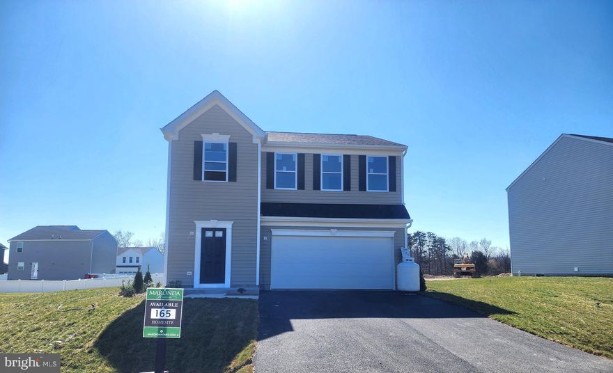Springtime Move-In! Embrace the Austin lifestyle with this charming residence! Offering 1,845 square feet, this 3-bedroom, 2-bathroom home is tailor-made for families. Step inside to discover a convenient powder room and a spacious 2-car garage on your right. The welcoming foyer leads to a generously sized family room and kitchen, perfect for hosting gatherings with its open-concept design. Enjoy sunny mornings in the bright breakfast nook adjacent to the island counter. Upstairs, three bedrooms and two full baths  and laundry room await. The owner's suite boasts a deluxe ensuite with a dual vanity, shower, and walk-in closet, while the second bedroom features its own walk-in closet. A shared dual vanity bathroom serves the remaining bedrooms. Don't miss this opportunity! Home currently in construction - photos for representation only. Schedule your tour today!