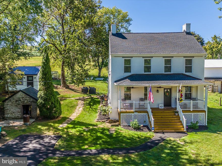 Welcome Home to this gorgeous, revitalized farmhouse, in the heart of Middletown! Back and better than ever. The meticulous care and attention to detail evident in every corner of this beautifully maintained home is a true pride of ownership. Nestled within a picturesque landscape encompassing 0.91 acres, this property is embraced by the serene beauty of surrounding mountains and lush farmland. Start your day with a tranquil cup of morning coffee or unwind with an afternoon cocktail on the recently renovated front porch now equipped with 3 NEW Fans. With 3 finished levels, 4 bedrooms, 2 full bathrooms, nearly 2,800 square feet of impeccably designed living space, and an 800 square feet unfinished basement ideal for storage, this home offers both style and functionality. The main level provides an expansive entertaining area, perfectly suited for hosting holiday dinners, gatherings, or leisurely game nights. Flowing seamlessly from the inviting living and dining spaces to the modern gourmet kitchen, sunlit sunroom, and cozy family room, the home exudes charm and warmth. Refinished hardwood floors, brand-new flooring, exquisite crown molding, chair railing, tasteful light fixtures, large windows, and fresh paint throughout create an inviting atmosphere that will make you reluctant to depart. The upper level houses a spacious primary bedroom with a walk-in closet, two additional bedrooms, and a thoughtfully designed hall bathroom featuring double vanities, built-in storage, and a tiled tub/shower. Ascend to the third level, where you'll discover a finished attic, versatile in function and suitable for use as a fourth bedroom, home office, theater room, or exercise space. Embrace the incredible outdoor living experience offered here. Whether you dream of raising chickens or cultivating your garden oasis, this spacious yard is fully fenced and includes a convenient driveway gate. Additionally, you'll find a generously sized shed and a well-equipped root cellar with electrical access, ensuring you have plenty of storage space at your disposal. Prepare to be WOW'd by the remarkable guest house! It has been completely revitalized, leaving no element overlooked. The renovation encompassed every facet, from new siding and pristine drywall to a contemporary roof, upgraded flooring, replacement windows, revitalized trim, improved insulation, and a comprehensive interior and exterior paint transformation. Property Updates Include: Porch Fans (August 2023), Water Heater (Nov 2022), Electric Heavy Up (Jul 2023), Septic Inspection & Pump (August 2023), Fence Installation (April 2023), Minisplit for Guest House (January 2023), Guest House Renovation (May 2023), Root Cellar Roof & Electrical Panel Replacement (August 2023), Root Cellar Concrete Floor (November 2022), Washing Machine (June 2022), New Wood Stove Install & Chimney Liner (December 2022), Sump Pump Replacement (Scheduled October 2023), 2022 Renovation Included: Kitchen &  Appliances, Flooring, Paint, 4 Ton HVAC System, Roof, Exterior Paint, Front Porch, Windows, Plumbing, Driveway Paving, Fireplace Mantles, Bathrooms, Duct Work, Doors, and so much more! This home is perfectly situated just minutes from 70, 66, 270 and Downtown Middletown. Don't wait, schedule your showing for this special home today! Property  Appraised by Six, McClain & Associates, Inc. Sept 2023.