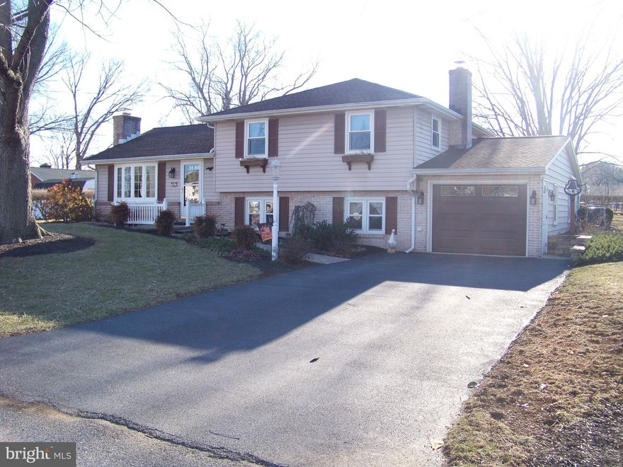 THIS PROPERTY TO BE OFFERED AT PUBLIC AUCTION ON SATURDAY, MAY 17,2025 AT 1:00 PM BY LEFEVER & HART AUCTIONS LLC. LISTED PRICE DOES NOT REPRESENT STARTING OR SALE PRICE. SALE PRICE WILL BE DETERMINED BY THE HIGHEST BID IF ACCEPTED BY SELLER. Very nice, well-maintained split-level home in Hempfield School District. Main level features renovated kitchen, dining area and living room w/ brick fireplace. Upper-level hosts three bedrooms and full bath. Lower level offers large family room and laundry. Attached one-car garage with full bath. Rear screened porch overlooking spacious backyard w/ storage shed. Central air, heat pump and some electric baseboard heating. Public water & sewer. Nice landscaping and neighborhood. This is a MUST SEE home!