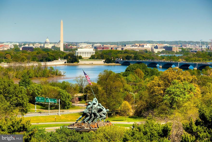 BEST VIEWS OF DC! Stunning 5-level townhome at Monument Place with 3 bedrooms, 3 full baths, & 2 half baths. Uniquely positioned within the 2nd Row offering views of DC from all living levels. Gourmet Kitchen with Island. Open Living Space. Stunning views of DC Monuments/Iwo Jima from roof deck with flower beds and outdoor kitchen. Half mile to Metro.