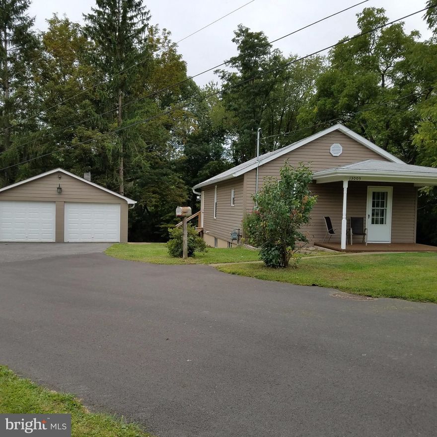 Tucked back off Bedford Rd in a quiet little neighborhood, situated on 2.50 acres, is a charming little home with a 2 car garage! Updates done in 2014, total re-wire, re-plumbed, vinyl siding, sofit and fascia, seamless gutters, new heat runs, kitchen and bathroom were gutted and all new fixtures ,cabinets and counters.  Clean and ready to move in!!    Seller is a Realtor