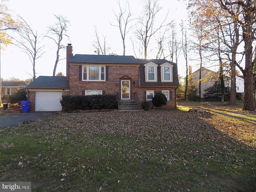 REDUCED 20k! SELLER MOTIVATED. Large corner lot.  New ROOF in 2014, New Thompson Creek WINDOWS in 2013, Remodeled KITCHEN with new plumbing, Granite counter tops, Maple Cabinets and SS appliances.2nd Full Kitchen in Basement. Wood stove in large Rec Rm. Fire pit in backyard, New floors and carpet throughout. New HVAC in 2013.