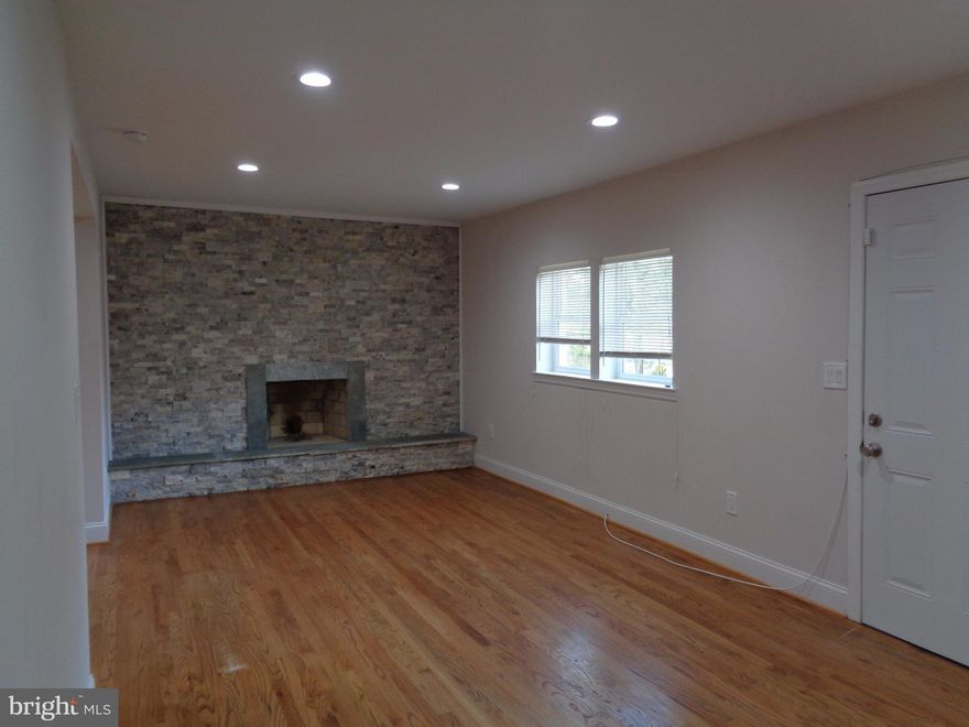 Beautifully updated ranch style home on large lot. This home has a sprawling, open living area w/ a gourmet kitchen with dining island and adjoining dining and living rooms. Stacked stone wood burning fireplace adorns the living room. Master bedroom with walk-in closet and adjoining full bath with custom tile and Jacuzzi tub. Large unfinished basement provides plenty of storage, newer laundry pair