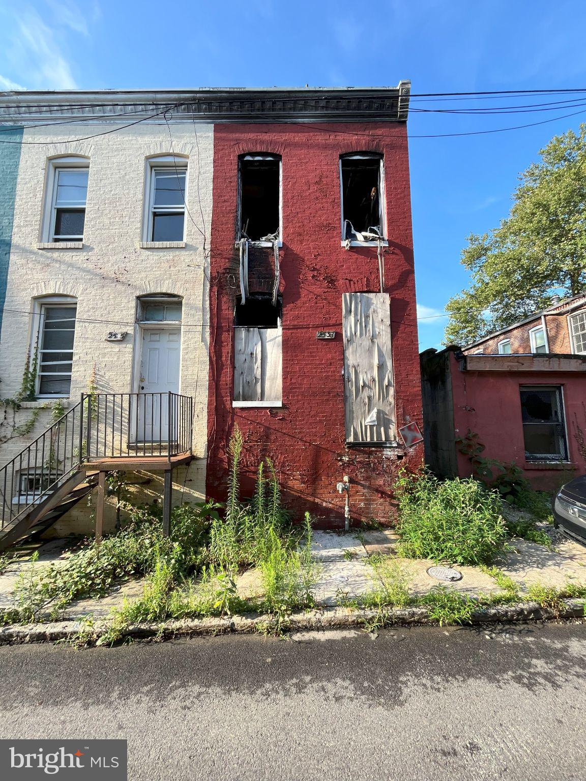 Unlock the potential of this 2-bedroom, 1-bath rowhome in the rapidly revitalizing Shipley Hill neighborhood of Baltimore. This property has experienced extensive fire damage and will require a full renovation, making it an ideal opportunity for experienced investors or rehabbers looking to create value in a strong rental market.
Conveniently located near Carroll Park and Gwynns Falls Park, this home offers quick access to commuter routes and public transit, enhancing its appeal to future tenants or buyers. Once renovated, properties in this area are leasing for between $1,300 and $1,500 per month, providing a solid return on investment.
This is an as-is sale and all written offers will be entertained. Please take extreme caution when showing the property due to its current condition. Don’t miss your chance to turn this distressed property into a successful investment—schedule your showing today.