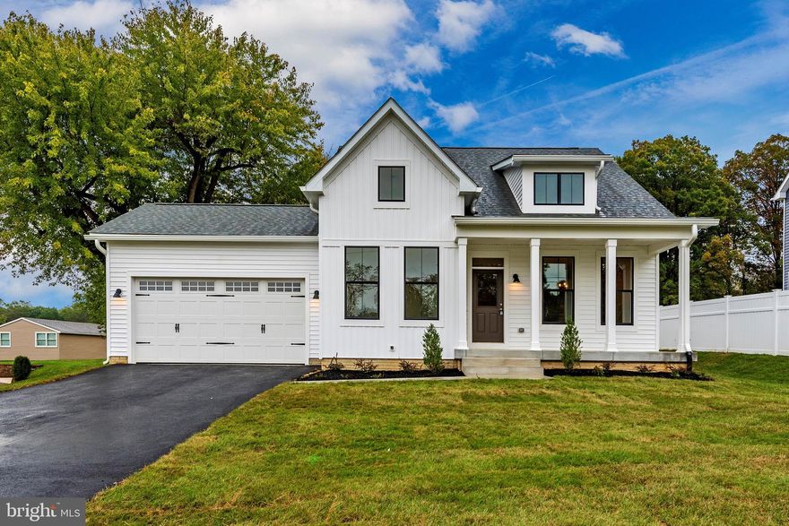 To-be-built Glenix Homes in Boonsboro features authentic Modern Farmhouse or Craftsman elevations, a spacious front porch, shaker-style cabinets, granite countertops, an oversized kitchen island, stainless steel Samsung appliances (WiFi enabled), 7" luxury plank vinyl floors, modern trim and finish details, Craftsman-style open railings and interior doors, a luxury primary suite, ceramic tile in all bathrooms, and much more. Additional features include 2x6 exterior walls, engineered LVL and steel beam support, high energy efficiency with R-49 attic insulation, a foam & caulk air-seal package, ThermaTru insulated doors, MI double-pane Low-E windows, Main Street CertainTeed vinyl siding, stone-wrapped column bases per plan, and extensive exterior trim and finishing details.
Pictured is the Rowan, but Glenix offers seven home designs with multiple elevations. Pricing is quick and easy with the builder’s online tools—call today to explore options, styles, colors, and pricing. Photos are of nearby properties and may reflect similar finishes.