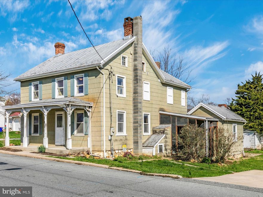 Looking for a home to make your own? This spacious farmhouse is the perfect canvas for your renovation ideas! Offering more room than meets the eye, the main level features a living room, dining room, and an eat-in kitchen with a pantry. Upstairs, you'll find three bedrooms, a full bath, and a versatile den/office space. Character abounds with hardwood floors, a walk-up attic, and an enclosed porch that leads to a charming summer kitchen with electricity—ideal for a home office, craft room, or creative retreat. The property also includes off-street parking, a vintage shed with a slate roof, and a spacious backyard ready for outdoor enjoyment. Conveniently located just minutes from parks, schools, shopping, and more, this is an incredible opportunity to restore and personalize a home with charm. Don’t miss out—bring your vision and make it your own!