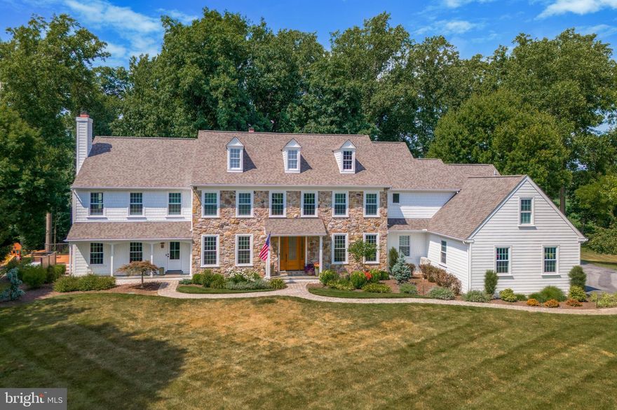 Welcome to 918 Copes Ln in the prestigious Heritage Farms neighborhood located in the Award-Winning West Chester School District. This private 5 bed, 4.2 bath home sits on nearly 2 acres that features stunning tree-lined views, a private spacious guest/in-law suite, elevator, and a lot more! You will be greeted by picturesque curb appeal and lush landscaping as you make your way to the main entry. Step in from the covered front porch to find yourself in the airy 2-story foyer with gleaming hardwood floors that carry throughout the majority of the home. The sizable dining room features modern pendant lighting and detailed molding. The fully equipped, eat-in kitchen offers stainless steel appliances, a 5-burner gas stove, plantation shutters, sleek black hardware, an abundance of natural light, and a large island with a plethora of storage and a veggie preparation station. Blended seamlessly off of the kitchen is the bright breakfast nook with access to your massive 2-tiered trex deck with serene views of the fenced-in portion of the yard. Flow effortlessly from the breakfast nook to the grand family room with a show stopping arched window, vaulted ceiling, and stone wood-burning fireplace. Tucked off the family room is the office with built-ins, your main level elevator access, and access to your cozy living room with contemporary pendant lighting. The right wing main level is made complete with a powder room, laundry room, and access to your 3-car garage. Head to the second level of the right wing where you will find your primary bedroom equipped with a sitting room with a detailed, gas-burning fireplace, large bedroom area with his and her walk-in closets, a massive en suite with a dual sink with vanity combo, skylights, chic lighting, separate water room, and another recently finished walk-in closet. The second level of the right wing also features 3 more generously sized bedrooms, a full hall bath, and elevator access. The guest suite makes up the left wing of the house and can be accessed through its own private entrance or from the right wing of the house. The guest suite main level comes equipped with a cozy living room with a timeless fireplace and built-ins, an eat-in kitchen with its own sun-kissed breakfast nook, powder room, and private walk-off deck with spiral staircase. The second level of the guest wing has its own stairwell and features a large guest suite with a private en suite and walk-in closet; as well as its own laundry. The finished, walk-out lower level is made up of a rec room with a built in bar, living room, exercise room, bonus room, full bath, and lower level elevator room with built-ins! There have been a number of RECENT UPGRADES since 2021 such as, two new HVAC systems, two new tankless hot water heaters, a primary bedroom mini-split installation, new windows, new exterior doors, flooring, plantation shutters, fencing, all new decks and railing, propane generator, sprinkler system for flower beds and pots, low voltage exterior lighting, new roof and more! Not to mention all the perks of being just a short-drive to the boro! A full upgrades list is available! This is a rare opportunity that will not last long, so book your showings today!