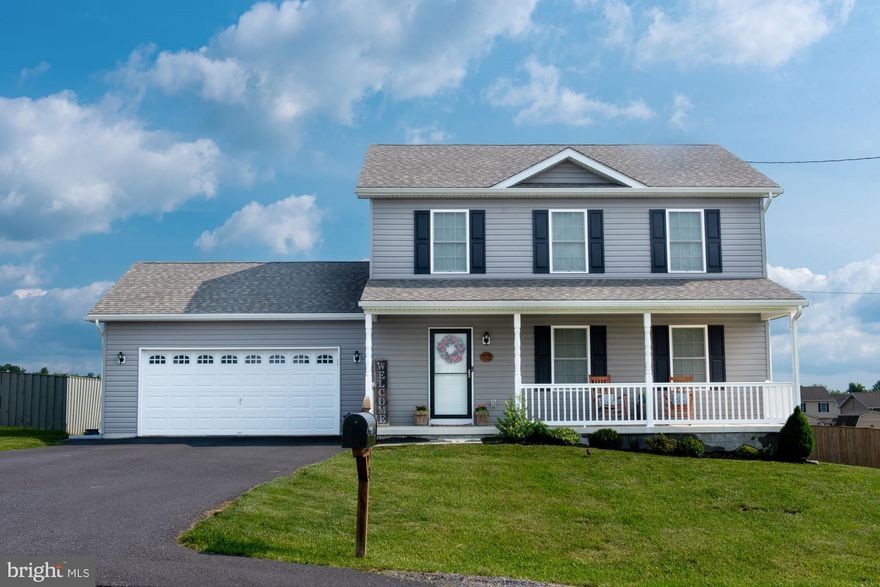 Welcome to 113 Hannah Lane in the well established Elizabeth Station Community.  This 3 bed, 2 1/2 bath, 2 car garage Colonial features a large family room, dining room, powder room, fully functional kitchen with SS appliances, Granite Counter Tops & pantry plus a Breakfast nook. LVP flooring throughout the main level.  Upper level boasts a large owners suite with walk-in closet.  Owners bath features LVP flooring & dual vanities.  2 additional bedrooms & a guest bath complete this level.  Exterior features a large front porch &  rear deck for entertaining or just relaxing after a long day.  Backyard offers plenty of room for outdoor fun!  Relax by the firepit while watching the sun set.  Why wait for new construction when you can own this beauty built in 2018.  Great location being just minutes from I-81. Close to Amazon, Proctor & Gamble along with being great for commuting to VA or MD.  Schedule your private showing today.