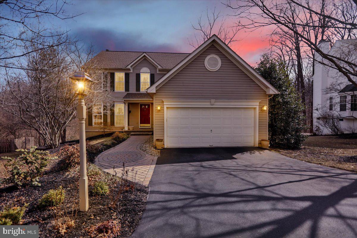 Step into this stunning 2 story home, built in 1997, offering 2,152 sq feet of living space plus a beautifully finished 400 sq ft basement. This gem features 3 spacious bedrooms, a walk-out basement with an office, storage area, and a cozy finished living area.
Enjoy your mornings in the 15x15 screened-in porch and deck off the breakfast nook, or host gatherings on the 15x13 open deck. Imagine sipping your coffee while listening to the soothing sounds of nature, including a creek, and taking in the beautiful tree views. The kitchen is a chef's delight with granite countertops, a double sink, electric cooking, and a dishwasher. Custom-built shelves in the kitchen, living room, and family room add both style and functionality. The dining room boasts elegant chair-rail detailing and the living room is brightened by a charming bay window.
The family room is the perfect spot to relax, featuring a warm wood fireplace. The primary bedroom is a true retreat with an ensuite bathroom featuring a tub shower, double sink, and a walk-in closet. Additional highlights include a 2020 roof with gutter guards, a 2021 hot water heater, and newer garbage disposal. The property also boasts a $27k retention wall in the rear, ensuring both beauty and functionality.
The open 2 story foyer welcomes you with grandeur, and the paver walkway leads to a delightful front porch.
Located in the desirable Williamsburg community, you will enjoy access to fantastic amenities and a vibrant neighborhood atmosphere.
Don't miss out on this incredible opportunity to make this house your home!