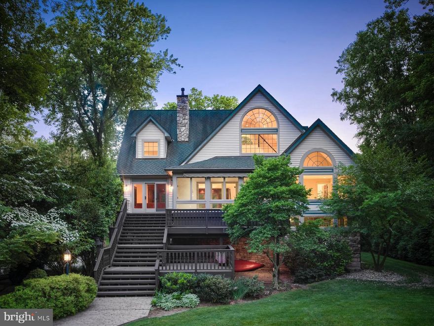 Welcome to this GRAND RIVERFRONT contemporary, fully renovated and ready for your year-round enjoyment!  Just 75 minutes to Manhattan and Philadelphia, and a few minutes to the cultural delights of New Hope, this exquisite Bucks County property is THE TOTAL PACKAGE.... elegant, fully updated home,  breathtaking Delaware River views, private dock, and private, manicured lot.   Enjoy boating, fishing, & water skiing from your own private dock. The beautiful pavered walkway and lush landscaping draws you up to the front door.... enter a spacious sunroom; perfect for enjoying the river views through the expansive glassline.  Step into the grand 3-story Living Area... a breathtaking space perfect for entertaining, or just relaxing with family & friends.  Beautifully refinished light hardwood flooring draws your eye throughout the open floorplan.   This space transitions to a spacious Dining Area, and into the gourmet Kitchen, complete with sleek quartz countertops, stacked stone backsplash, and brand new stainless appliances, including gas stove, french-door refrigerator, built-in microwave,  & wine refrigerator.  The expansive work space is perfect for multiple chefs to take part in preparing holiday meals!  The large island seats 6 comfortably, and will be a natural gathering spot.  Extensive custom cabinetry provides plenty of organized storage.   The Living Area opens to a cozy Den with pass-thru to the Kitchen and direct access to the riverfront deck.   A sumptuous Primary Suite awaits you at the end of the day, featuring exquisitely renovated Primary Bath with high-end fixtures & magnificent marble tilework.  Dual custom closets and breathtaking river views complete this hotel-quality suite.  A Guest Bedroom, just-renovated Hall Bath, and Laundry complete this Main Level. Upstairs features two large Loft areas overlooking the main living space, and is perfect for lounging, work-out space, or art studio.  Two Bedrooms, a just-renovated Full Bath, and expansive windows offering spectacular river views complete this 2nd level.  Upstairs to the 3rd level, you will be taken by the stunning view of the lower interior spaces and the breathtaking river views through the magnificent windows.  This level offers convenient home office workspace with abundant countertops and plenty of storage space.  At ground level, expansive heated garage space affords storage for cars, boats, tools, and your other water toys.  4 overhead garage doors provide convenient access to both sides of the space.   A handy full bath with outside access allows for convenient cleanup after a day on the water.   Standby generator and new heating system provide peace of mind.   Outside, enjoy the extensively landscaped grounds in complete privacy.  To the rear, take advantage of easy towpath access for bike riding and walking.  A bocce court will add to your fun!  On the riverfront, enjoy the lush lawn & garden area along with two levels of decking for gathering around a fire and relaxing after a day of aquatic adventure!  The floating dock provides ample space for your watercraft.   This property has been meticulously maintained and fully updated.  Unbeatable location.... a short drive to the enchanting towns of Milford, Frenchtown, and New Hope.  Nothing else like it on the market.... nothing to do but move in and let the fun begin.... start making memories now!  Make your appointment to see it before it's too late!