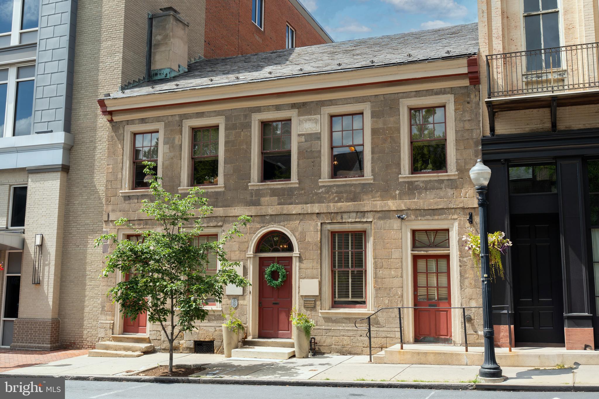 Experience a property truly unlike any other! Located one block from Penn Square, this Georgian-style townhome is the oldest property in the city with a date stone, tracing it's roots back to 1762!
Zoned CB1, this mixed-use property offers tremendous opportunity. Historic character with modern amenity! Wow
RESIDENTIAL LUXURY
One of the finest residences in all of downtown Lancaster, this 3 bedroom, 3.5 bathroom condo provides a tranquil retreat from the bustling urban landscape. Notice the attention to detail, and the quality of the materials. Hardwood floors and granite countertops adorn the residence and create the unmistakable feeling of home.
COMMERCIAL OPPORTUNITY
5500+ square feet of commercial opportunity await, featuring dedicated office space and open collaborative areas that foster an environment of creative productivity. Let your imagination run wild!
PRIVATE PARKING - DOWNTOWN LANCASTER
Full and private access to a 14 car enclosed garage located off of E Grant St, use this well-lit and spacious garage to support your commercial/residential activities. Features an charger for Electric Vehicles (EVs). Very rare for a location like this
RICH HISTORY
Has touched many famous Lancastrian's. Primary office space designed by C. Emlen Urban for Milton Hershey to entice him to this area. This property is truly one-of-a-kind! Schedule your showing today