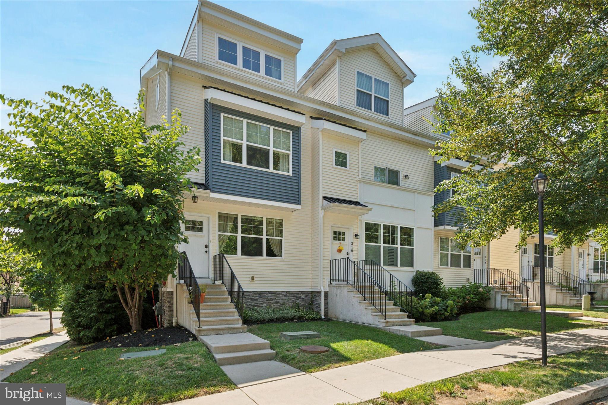 Welcome to 220 Wood Street! This stunning 3 bed, 3.5 bath end-unit townhome in the heart of Conshohocken blends modern style, thoughtful upgrades, and an abundance of natural light. Step inside to find rich dark hardwood floors, soaring tray ceilings, and oversized windows that brighten every corner. The open-concept main level is an entertainer’s dream, featuring a spacious living room with a striking stone gas fireplace that flows effortlessly into the dining area and gourmet kitchen. The kitchen is a showstopper with white shaker cabinets, granite countertops, a large center island with bar seating, pendant lighting, and stainless-steel appliances. Upstairs, the luxurious primary suite offers vaulted ceilings, generous windows, and ample closet space, while the additional bedrooms are perfect for guests, a home office, or a personal retreat. Every detail has been designed for comfort and style, from the chic fixtures to the peaceful, tree-lined views. All of this is just steps from Conshohocken’s shops, dining, parks, and vibrant community life making this the perfect place to call home.