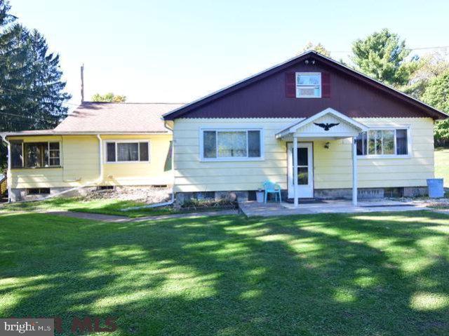 Ranch home on .68 acre flat lot in Chester Hill. Enjoy the yard with gazebo, swing, front screened porch, and circle driveway for easy ingress/egress. Home has 4 bed, 1 ba, large eat-in-kitchen, full basement, upgraded electric service. Workshop area in basement, laundry on first floor, oil/hot water heater. Priced to Sell, ready to move in! Schedule quickly or regret later!