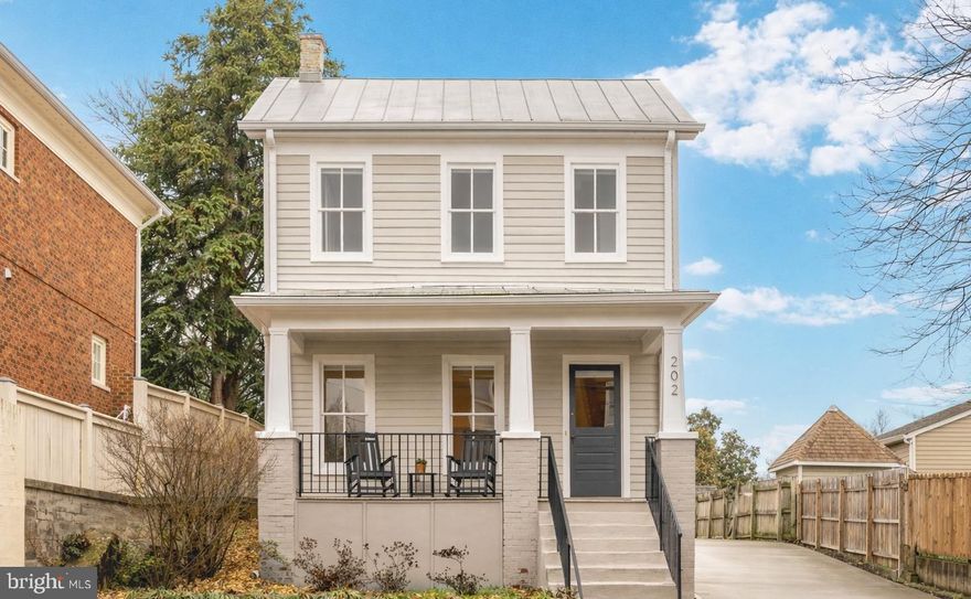 This 3 bedroom, 3 full bath home was comprehensively restored in 2020–2021- thoughtfully updated from head to toe while preserving the architectural details that make downtown homes so special.

During the restoration, the home received a new Galvalume metal roof, dual-zone HVAC systems, updated plumbing and electrical, spray foam insulation, new drywall, restored siding, and stainless steel appliances. Inside, you’ll find restored patina hardwoods and quarter-sawn white oak floors, fully renovated kitchen and bathrooms, and custom cabinetry.

Set on an expansive parcel in the Historic District, this property offers something rarely found downtown: space. Whether you envision gardens, outdoor entertaining, expansion potential, or simply enjoying privacy in the middle of it all, the possibilities here are truly special.

Off-street parking, walkability to coffee shops, restaurants, the VRE, parks, and the Rappahannock River — this is downtown living done right.

Homes like this don’t come along often- thoughtfully restored, mechanically updated, and positioned on one of the most versatile lots in the city.